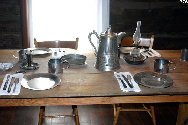 Pewter table setting in log Governor's Mansion at Sharlot Hall Museum. Prescott, AZ.