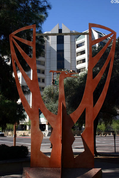 Steel sculpture of a Phoenix bird seen against Maricopa County Administration Building. Phoenix, AZ.