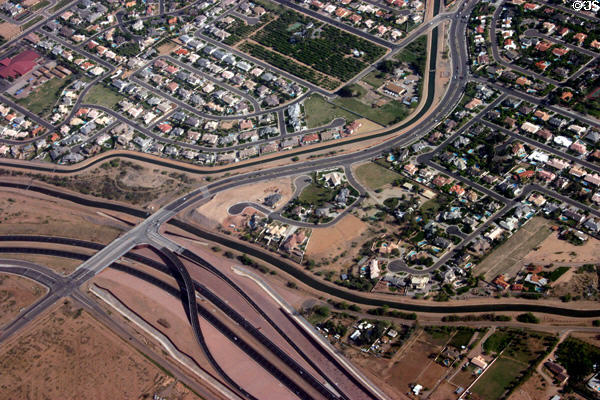 Phoenix suburbs & canal seen from air. Phoenix, AZ.