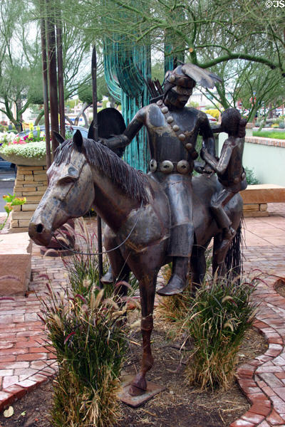 Metal sculpture of native on horseback. Scottsdale, AZ.