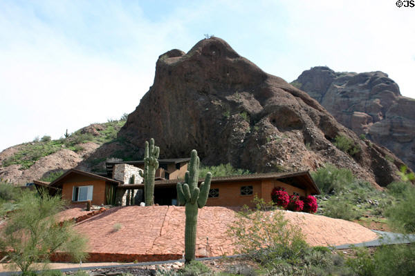 Modern house below boulders of Echo Canyon Park. Phoenix, AZ.
