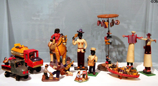 Painted earthenware people from Ecuador (1980s) showing working & folk figures at Tucson Museum of Art. Tucson, AZ.