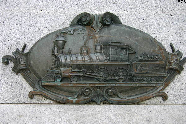 Plaque of steam locomotive on A.J. Stevens monument in César Chavez Square. Sacramento, CA.