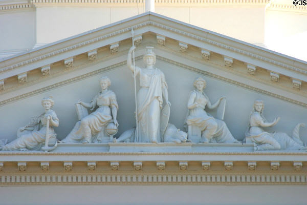 Pediment detail of California State Capitol with statue of California & bear flanked by women symbolic of the arts. Sacramento, CA.