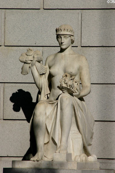 Classical-style statue of woman holding clouds with rain & team of horses in front of Jesse Unruh State Office Building. Sacramento, CA.
