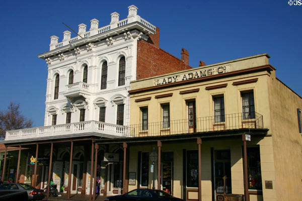 White Italianate building (113 K St.) & Lady Adams Building (1852) (117-19 K St.) made from materials brought round the horn by ship Lady Adams in Old Sacramento. Sacramento, CA.