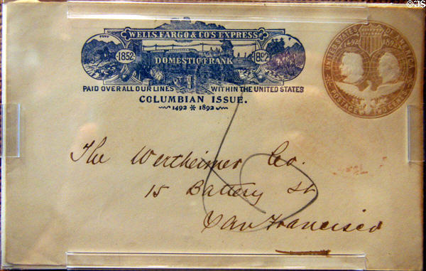 Envelope embossed with Columbus discovery anniversary (1892) postage stamp plus domestic frank of Wells Fargo fees so that letter could be expressed to its destination & be carried to final address by postman at Wells Fargo Museum. Sacramento, CA.