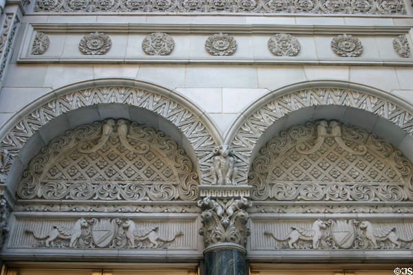 Winged lions & parrots carved in arches of Fine Arts Building. Los Angeles, CA.