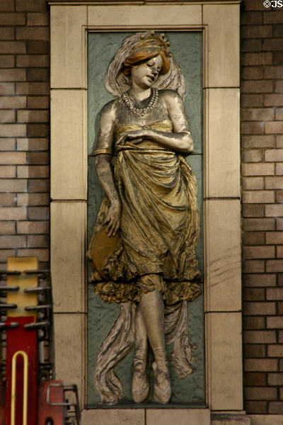 Terra-cotta panel of dancing woman on Palace Theater. Los Angeles, CA.