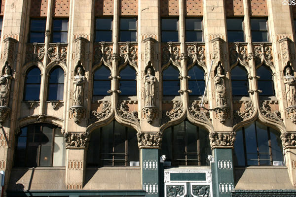 Row of carved figures on United Artists Theater facade. Los Angeles, CA.