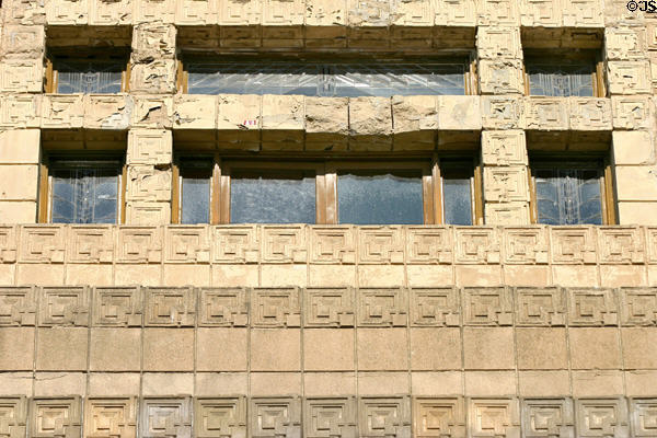 Crumbling concrete blocks around windows of Ennis House. Los Angeles, CA.