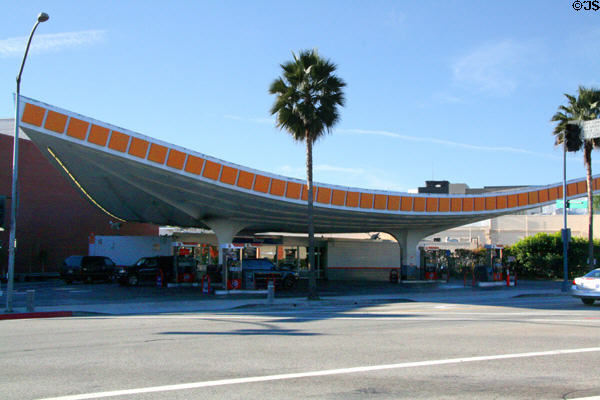 Gas Station with formed triangular roof at corner S. Santa Monica Blvd. & Crescent Dr. Beverly Hills, CA.
