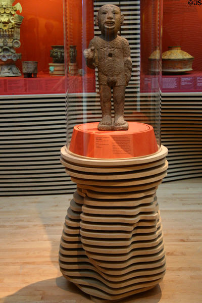Aztec ceramic man as Xipe Totec (1400-1521) in native American gallery at LACMA. Los Angeles, CA.