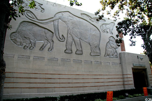 Allan Hancock Foundation at USC with Alfred Newman Recital Hall decorated with reliefs of prehistoric creatures. Los Angeles, CA.