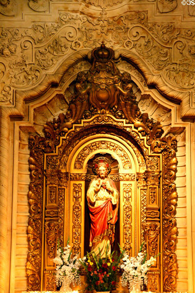 Niche with Christ statue in Saint Vincent Catholic Church. Los Angeles, CA.