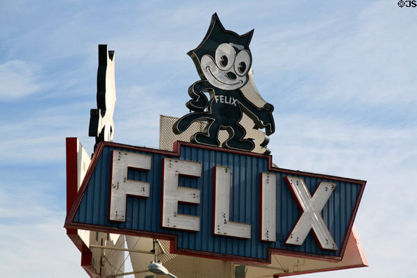 Felix the Cat neon sign (1959) historic landmark on car dealership on Figueroa St. Los Angeles, CA.