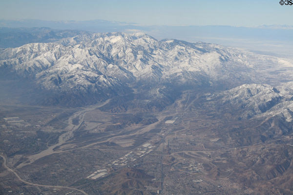 Aerial view along Barstow Freeway & Old Route 66 up mountains. CA.