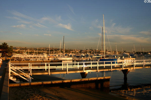Boat docks in channel off Balboa Island. CA.