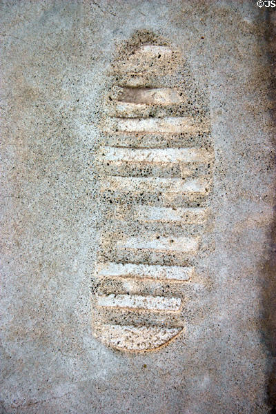Footprint in concrete made by Buzz Aldrin using boots he used as first man on the moon at Nixon Library. Yorba Linda, CA.