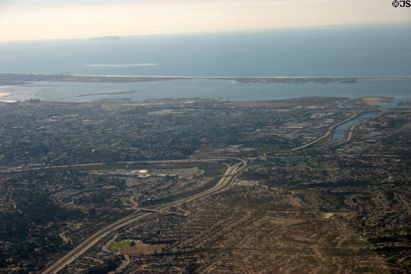 Aerial view down San Diego's South Bay Freeway across to Coronado Island. CA.