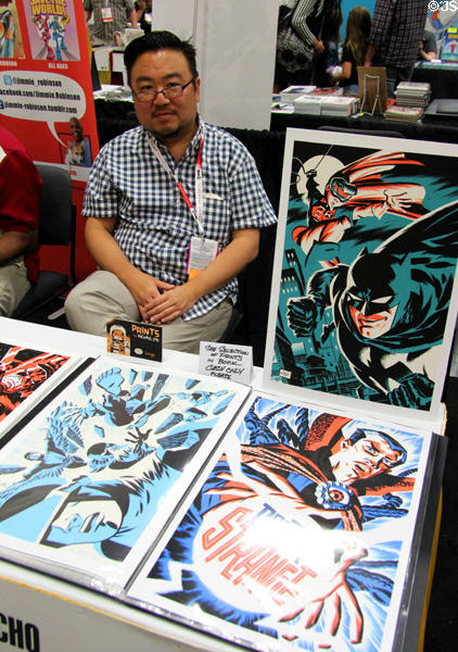 Artist Michael Cho with his comic prints at Comic-Con International. San Diego, CA.