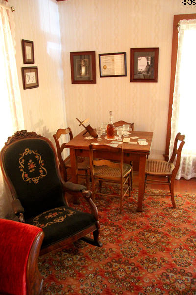 Rocking chair & card table at Davis House Museum. San Diego, CA.