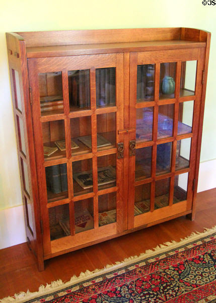 Arts & crafts glass-fronted bookshelf at Marston House Museum. San Diego, CA.