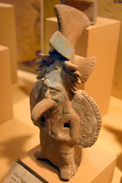 Mayan pottery male figure (600-900) with bird's beak & wings in Jaina style at San Diego Museum of Man. San Diego, CA.