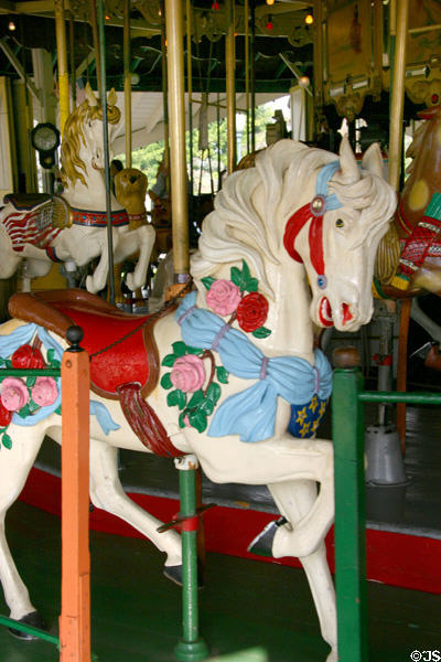 Carved horse with roses on Balboa Park Carousel. San Diego, CA.