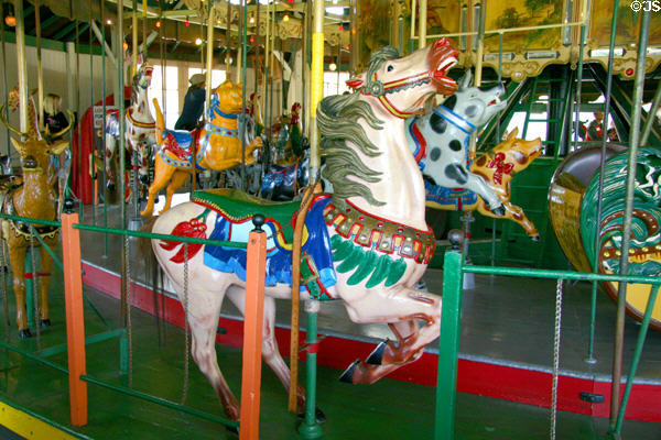 Carved horse with Indian symbols on Balboa Park Carousel. San Diego, CA.