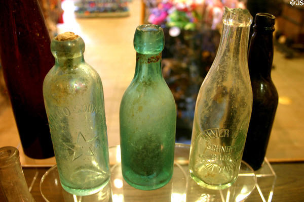 Antique glass soda bottles (c1890) in Casa de Aguirre museum in Old Town. San Diego, CA.