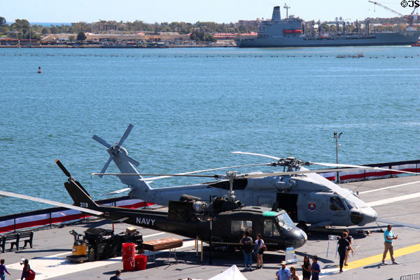 Bell UH-1B Iroquois "Huey" & Sikorsky H-60 Seahawk helicopters at Midway aircraft carrier museum. San Diego, CA.