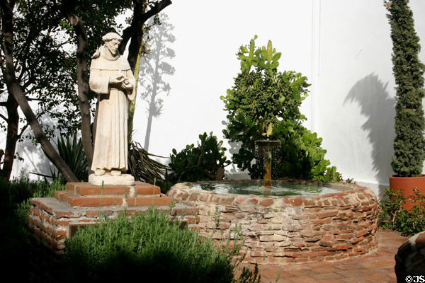 San Luis Rey Mission Church fountain with St Francis of Assisi. Oceanside, CA.