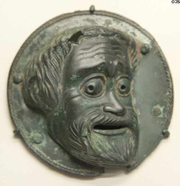 Greek bronze roundel with comic mask (c300 BCE) from South Italy at Getty Museum Villa. Malibu, CA.