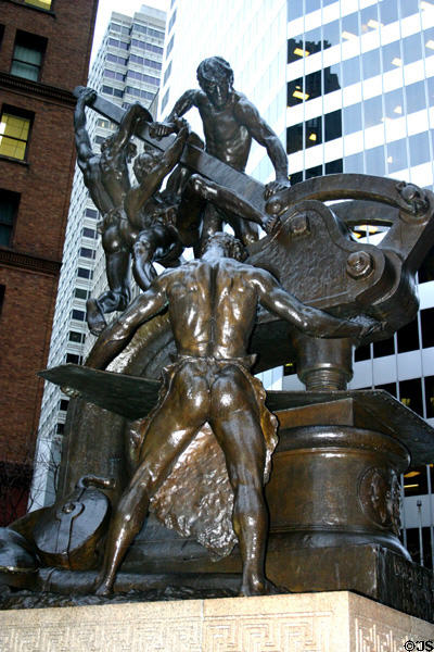 Monument shows Mechanics working sheet metal. San Francisco, CA.