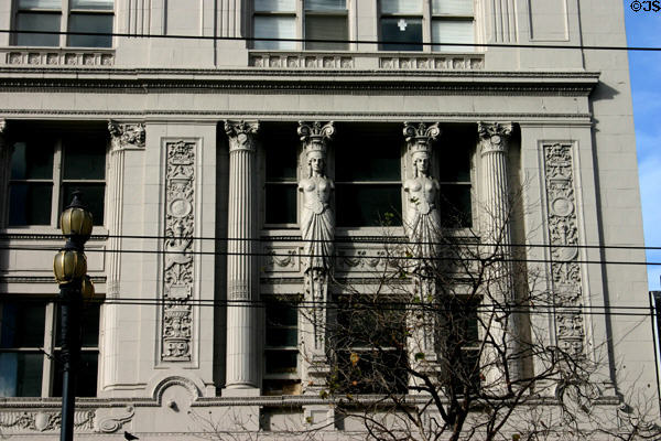 Caryatids on classical building on Market Street. San Francisco, CA.