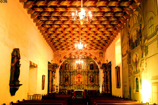 Chapel interior with wooden beams painted in vegetable dyes by Ohlone Indians in Mission Dolores. San Francisco, CA. Style: Spanish Baroque.