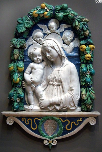 Virgin & Child with Putti glazed terracotta relief (c1490-5) by Andrea della Robbia of Florence at Legion of Honor Museum. San Francisco, CA.