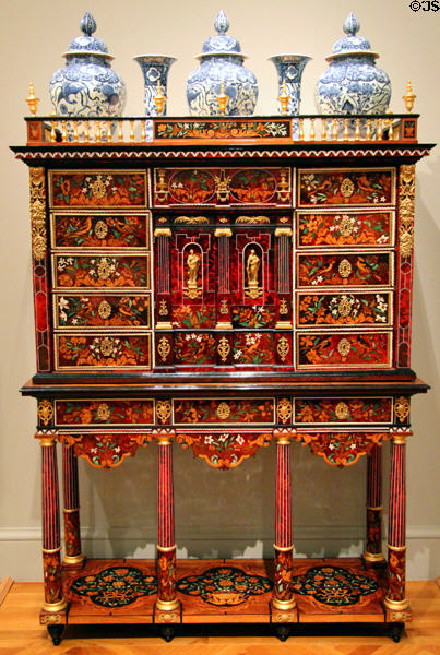 Inlaid cabinet on stand c1665 by Pierre Gole of Paris, France supporting five Japanese vases (late 17thC) at Legion of Honor Museum. San Francisco, CA.
