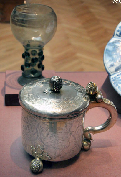 Silver tankard c1650 by Abraham Meytens of Stockholm before Dutch goblet (17thC) at Legion of Honor Museum. San Francisco, CA.