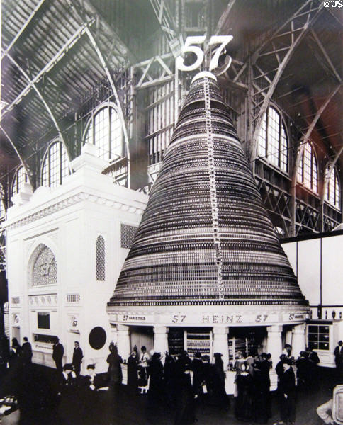 Print showing Heinz 57 booth with giant cone where each ring shows one of its 57 products at Panama-Pacific International Exposition (1915) in private collection. San Francisco, CA.