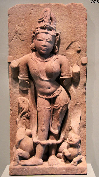 Hindu deity Shiva with goddess Parvati combined as Ardhanarishvara sculpture (900-1100) from Rajasthan or Uttar Pradesh, India at Asian Art Museum. San Francisco, CA.