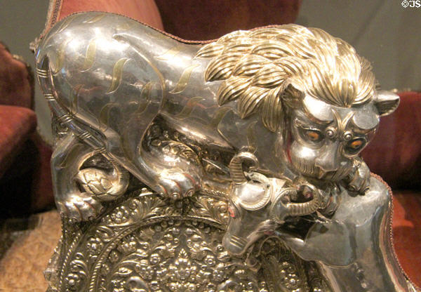 Gilded & silver detail of lion on Elephant throne (1870-1920) from India at Asian Art Museum. San Francisco, CA.