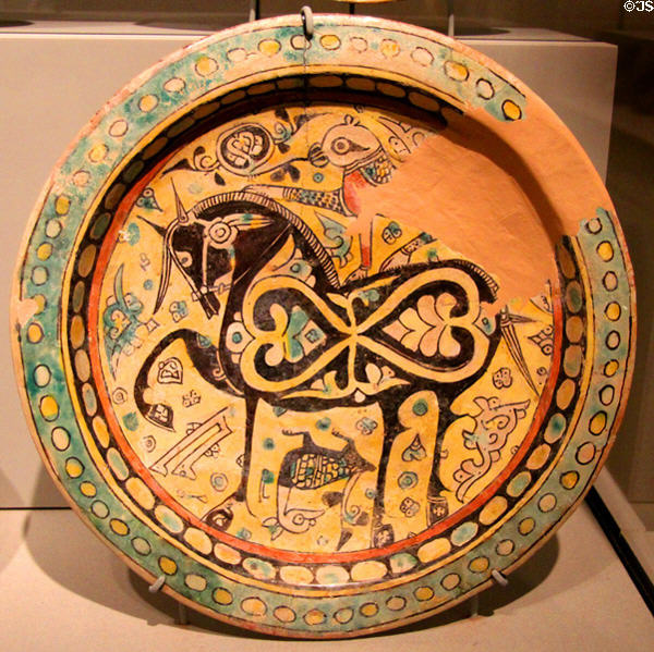 Earthenware disk with horse & cheetah (900-1000) from Eastern Iran at Asian Art Museum. San Francisco, CA.