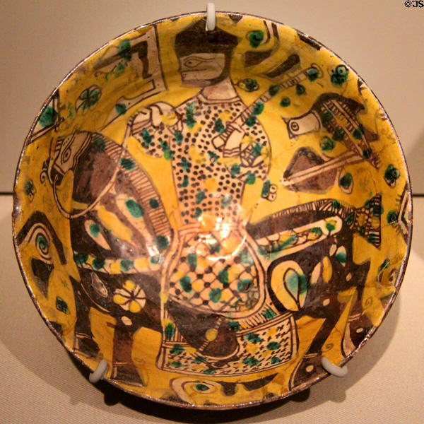 Earthenware bowl with horse & rider (c1000) from Eastern Iran at Asian Art Museum. San Francisco, CA.