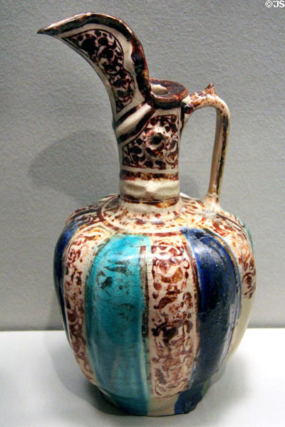 Earthenware fritware ewer in shape of melon (1100-1300) from Iran at Asian Art Museum. San Francisco, CA.