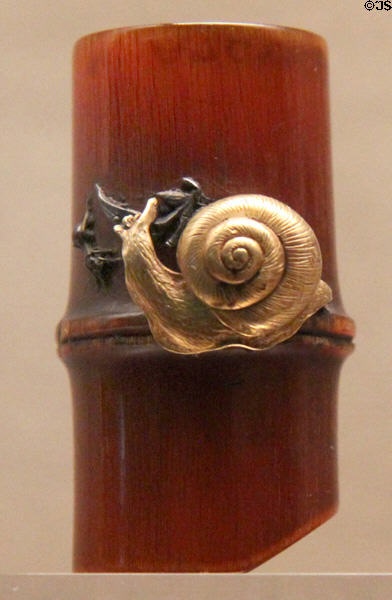 Netsuke of snail & ant on bamboo (c1800-1900) from Japan at Asian Art Museum. San Francisco, CA.