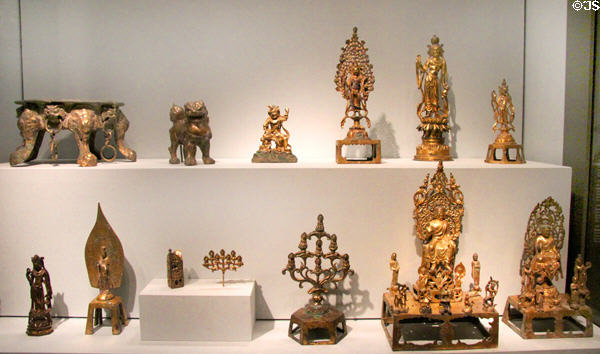 Gilt bronze sculptures related to Buddhism (618-906) from China at Asian Art Museum. San Francisco, CA.