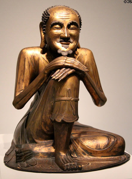 Gilt bronze sculpture of Buddha Shakyamuni as ascetic (1600-1700) from China at Asian Art Museum. San Francisco, CA.
