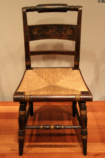 Side chair with woven rush seat (1826-9) by Lambert Hitchcock at de Young Museum. San Francisco, CA.